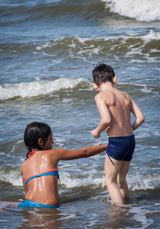 Niños Disfrutando del Mar, Necocli, Antioquia, Co...