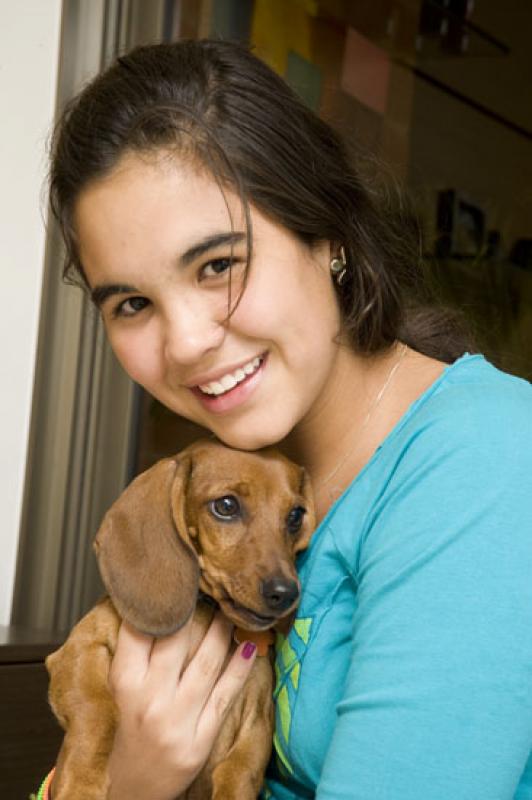 NiÃ±a con su Cachorro