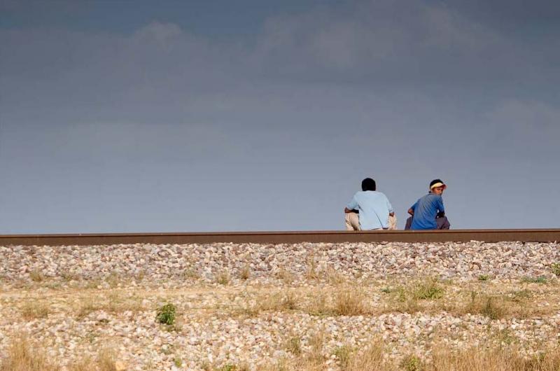 Hombres Sentados en las Vias Ferreas, Guajira, Col...