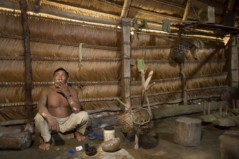 Indigena en el Interior de una Maloca, Amazonas, L...