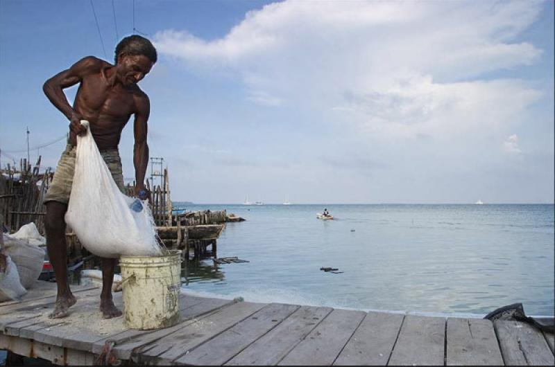 Hombre Trabajando, Santa Cruz del Islote, Golfo de...