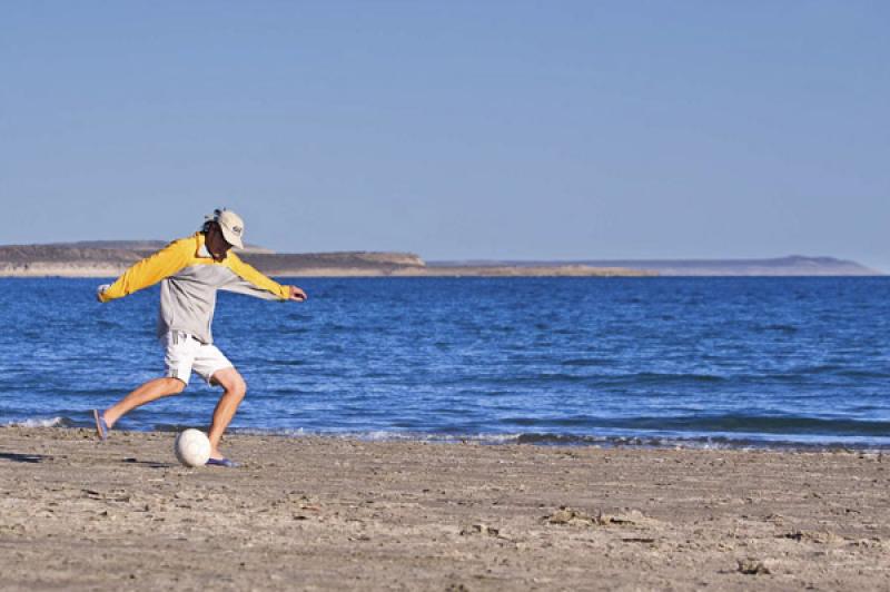 Hombre Jugando Futbol, Peninsula Valdes, Patagonia...