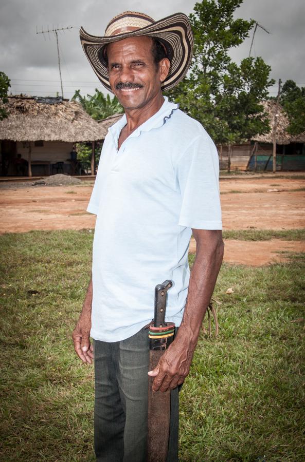 Retrato de Campesino con Machete y Sombrero